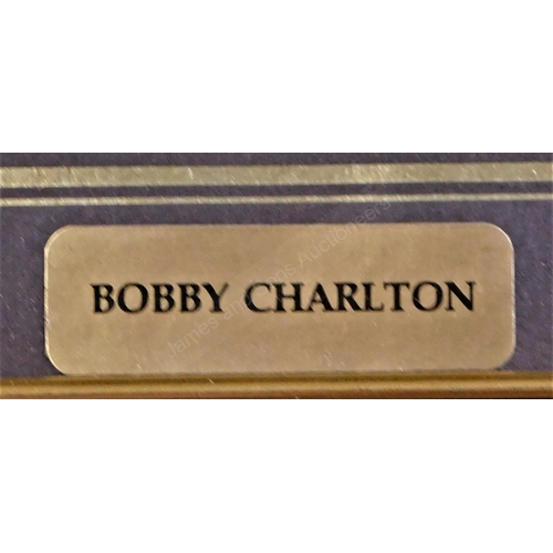 268 - A framed limited edition painting of Bobby Charlton plus a photo (possibly a press photo) of Charlto... 