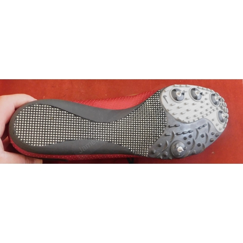 248 - Nike Running Spikes, a pair in red, size 13 and in good condition