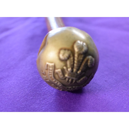 105 - The Welch Regiment WWII Swagger stick, Silver-plated top with brass tip. Shows some signs of wear