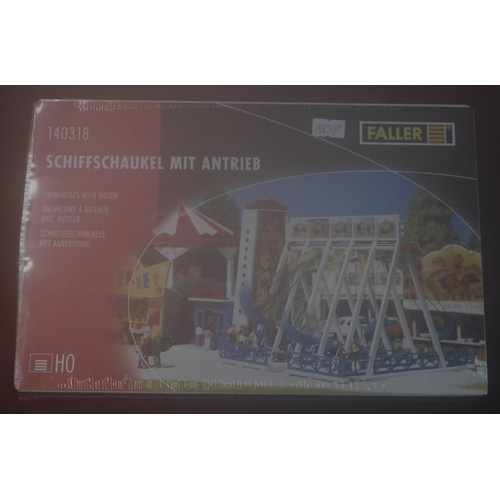 1039 - Faller Swingboats with Motor 140318. Mint in box.