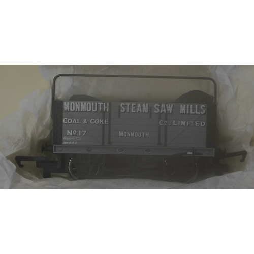 1051 - Hornby R6297A 7 Plank Wagon with Sheet Rail and Cover 'Monmouth Steam Saw Mills Co Ltd'. Mint in box... 