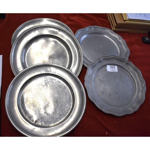 315 - Pewter Plates - assorted design 24cm across (5) good condition