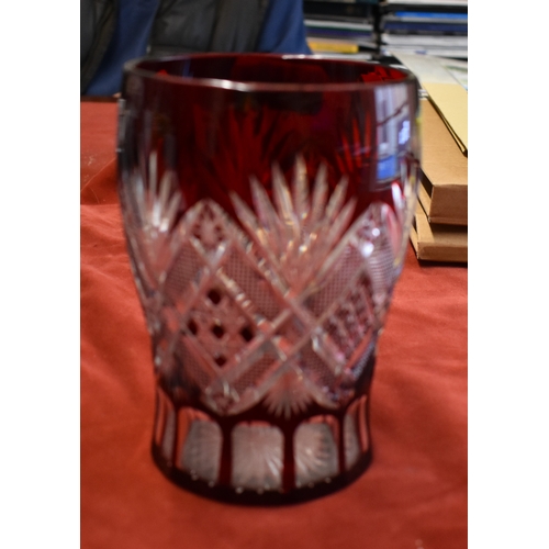 318 - Vase - Red glass vase with machine cut design, 15cm tall, excellent condition