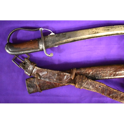 70 - A 19th century Ethiopian/ Abyssinian style Native African made Heavy Cavalry sabre, The leather scab... 