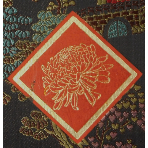 140 - China 1972-74 - Small fabric covered folder with rural embroidered design, containing (8) u/m commem... 