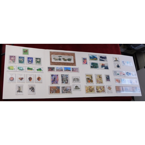 149 - China 1990- China National Stamp Corporation Folder containing commemorative u/m 1990 issues, cat va... 