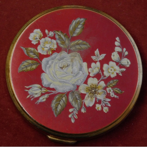 583 - Boots Cream Powder Compact - never been used, attractive foral design with red painted lid