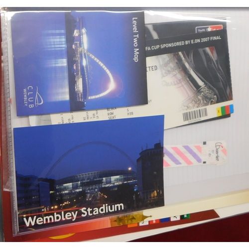 11 - Three folders of Manchester United ephemera from the 1970s to the 2000s. A hospitality card at Wembl... 