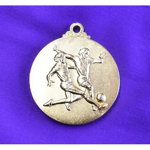 357 - An engraved medal presented to a Manchester United player on the 20th July 1997 for the pre season g... 