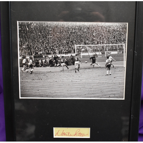 466 - Framed signed photo of Martin Peters, signed outside Cliff Hotel Oct 1964 BUYER TO COLLECT