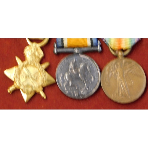 517 - British WWI Trio miniature group including 1914-1915 Star, War Medal and Victory Medal with pin back... 