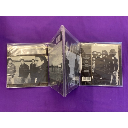 816 - U2 'Joshua Tree Singles' Limited Edition Pack Limited edtion UK release of one US and three UK singl... 