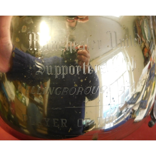 196 - A 38cm high engraved trophy presented to the Manchester United Player of the Year by the Wellingboro... 