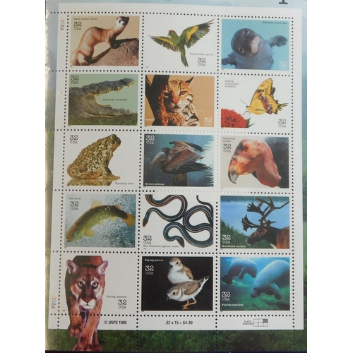 1033 - USA Wildlife 1978-1996 Philatelic package (stained) poste by SG's London to Stowmarket with hardback... 