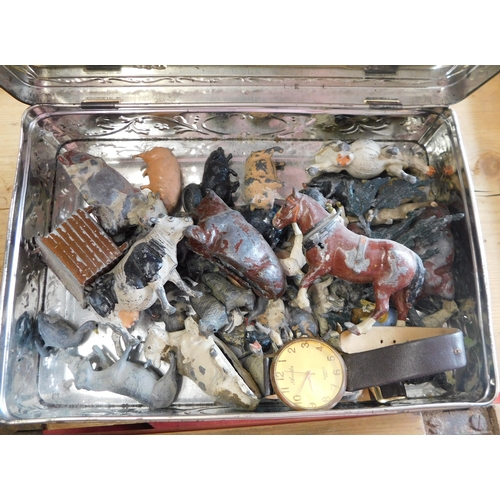 679 - An oak toy box containing vintage lead farm animals, figures and accessories including some Britains... 