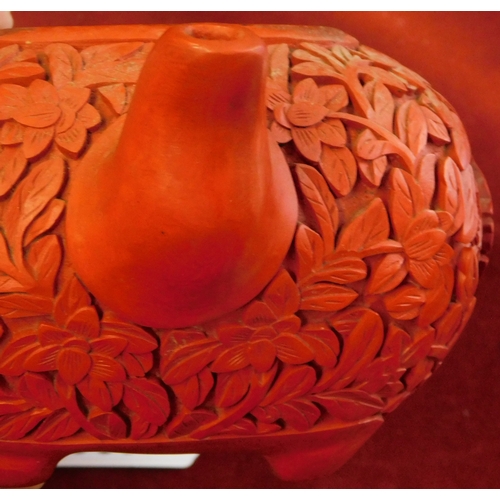 699 - Chinese cinnabar lacquered Yixing teapot, a stunning red teapot with floral relief