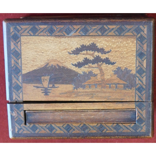 550 - Vintage Oriental novelty wooden Cigarette dispenser, a beautiful inlaid box with a scene of a sailin... 