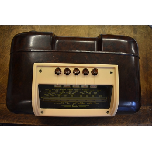 562 - VINTAGE BUSH BAKELITE RADIO. A vintage 1950 Bush DAC-10 radio in two-tone bakelite with glass tuning... 