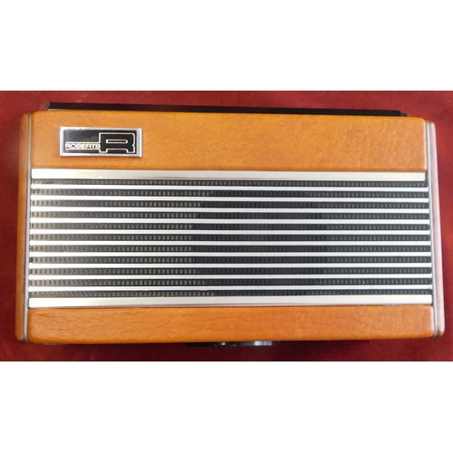 573 - Roberts RT22 AM/FM Transistor Radio, made in the 1970s with brown leather front and back with wood s... 