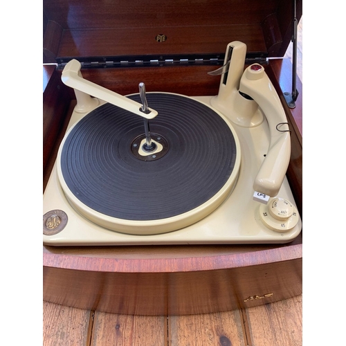 588 - PYE RECORD PLAYER IN WOODEN CASE. A vintage Pye 'Black Box' portable gramophone with Monarch record ... 