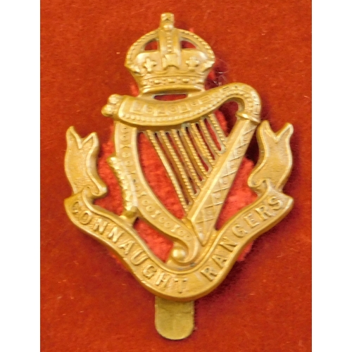 244 - British WWI Connaught Rangers Cap Badge, gilding metal and slider