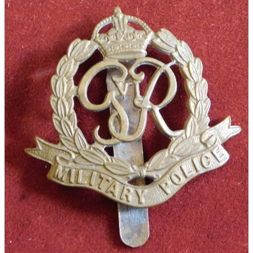 254 - British WWII Military Police Cap Badge, gilding metal and slider