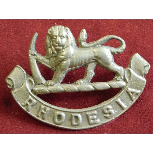 265 - Rhodesian Army General Service Cap Badge, cast brass with lugs