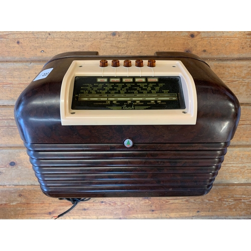 33 - A vintage 1950 Bush DAC-10 radio in two-tone bakelite with glass tuning display and push-button band... 