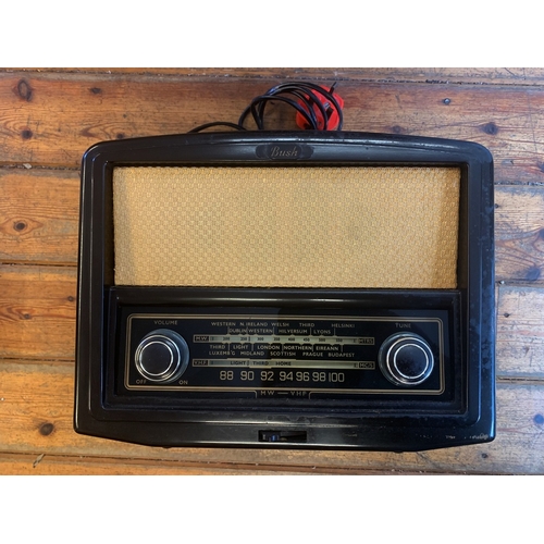 5 - VINTAGE BAKELITE RADIO. A vintage Bush VHF90 valve radio receiver, circa 1956. Dark brown bakelite c... 