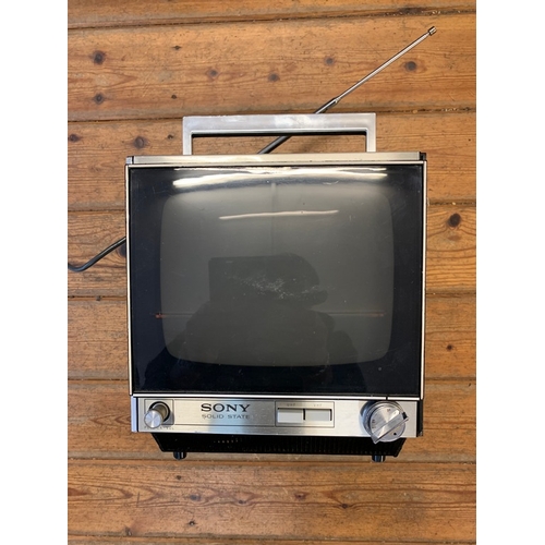 51 - 1960s Portable Television Receiver. A Sony 9-90UB portable television from the 1960s. Inbuilt extend... 