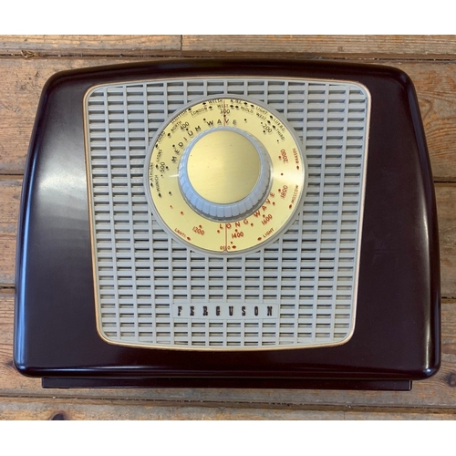 7 - VINTAGE BAKELITE RADIO. Vintage walnut and cream bakelite 352U radio by Ferguson. A budget-line thre... 