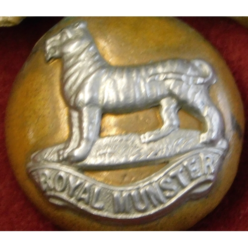 243 - British WWI Royal Munster Fusiliers Cap Badge, bi-metal and slider