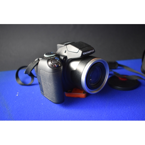 306 - Camera - Olympus SP-590UZ 12 Megapixel 26x Optical Wide Zoom Digital Camera with bag, leads, instruc... 