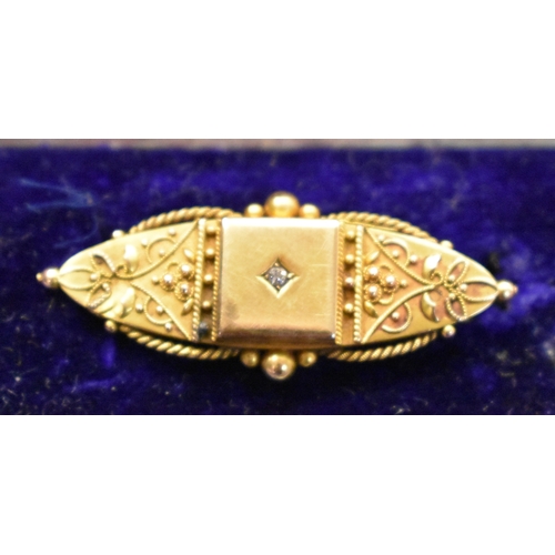 130 - Gold Brooch, stamped 15ct with white cut stone (diamond). Fine gold details, missing pin on back. In... 