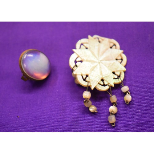 133 - Red Coral Brooch, carved reclining lady with cherub. Missing rear pin. Plus Red Coral and metal clas... 