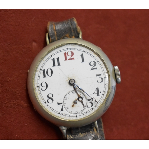 138 - Trench Style Watches x2. 1920's-30's. Swiss made. Wire lug, Nickel cases. Approx 33mm diameter. In n... 