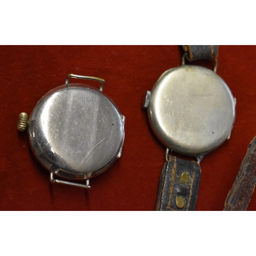 138 - Trench Style Watches x2. 1920's-30's. Swiss made. Wire lug, Nickel cases. Approx 33mm diameter. In n... 