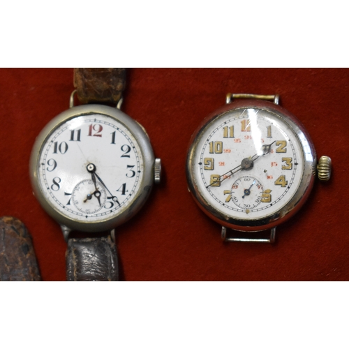 138 - Trench Style Watches x2. 1920's-30's. Swiss made. Wire lug, Nickel cases. Approx 33mm diameter. In n... 