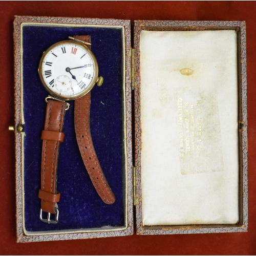 233 - Men's 9ct Gold Trench Watch from 1914. Hallmarked case with swing lugs. Nice enamelled dial with Red... 