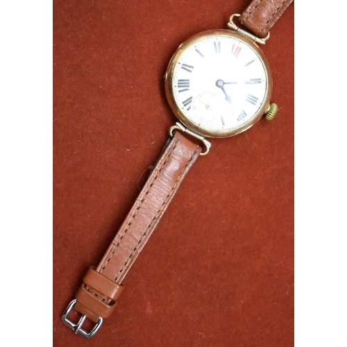 233 - Men's 9ct Gold Trench Watch from 1914. Hallmarked case with swing lugs. Nice enamelled dial with Red... 