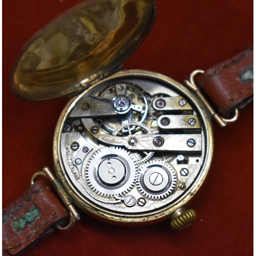 233 - Men's 9ct Gold Trench Watch from 1914. Hallmarked case with swing lugs. Nice enamelled dial with Red... 