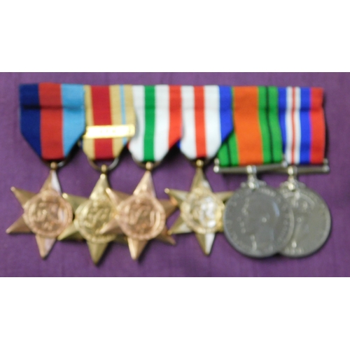 266 - British WWII six place 8th Army and Normandy Medal group and three miscellaneous medals awarded to F... 