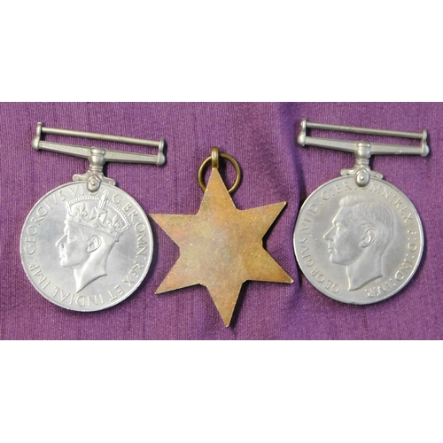 268 - British WWII War Medal Trio including The France and Germany Star, The Defence Medal and The 1939-19... 