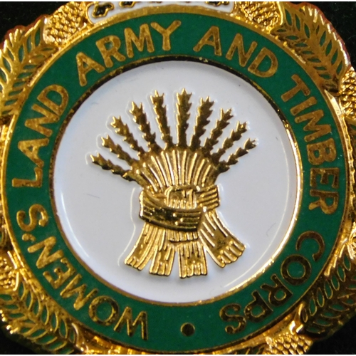 302 - British Womens Land Army & Timber Corps EIIR pin badge, made by Firmin in gilt and enamel.