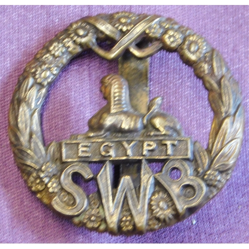 305 - British WWI South Wales Borderers (SWB) Regiment Brass Economy Cap Badge, brass with slider