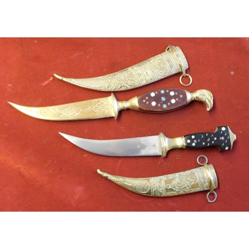 338 - Syrian souvenir Jambiya Khanjar daggers (2), one with an eagle shaped pommel and brass engraved blad... 