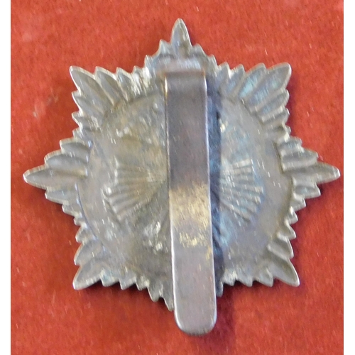 323 - British EIIR Gurkha Transport Regiment cap badge, bi-metal with slider