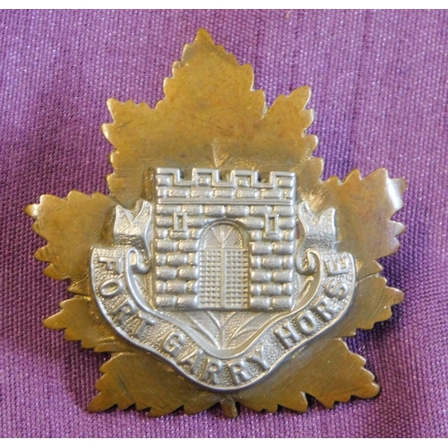 350 - British Commonwealth WWII Canadian Fort Garry Horse Regiment CEF Cap Badge, bi-metal with lugs and s... 