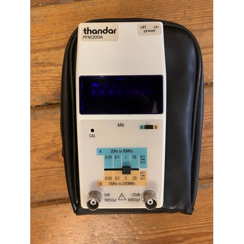 244 - Frequency Counter. A Thandar PFM 200A frequency counter, circa 1980. Good condition, in carry pouch ... 