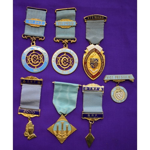 225 - Masonic Medals x7. One Sterling Silver. Otherwise gilt metal with enamel and ribbons. Very good cond... 